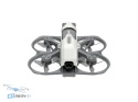 Dron FPV CaddxFPV Protos z osłonami śmigieł, zaprojektowany do bezpiecznych lotów indoor.